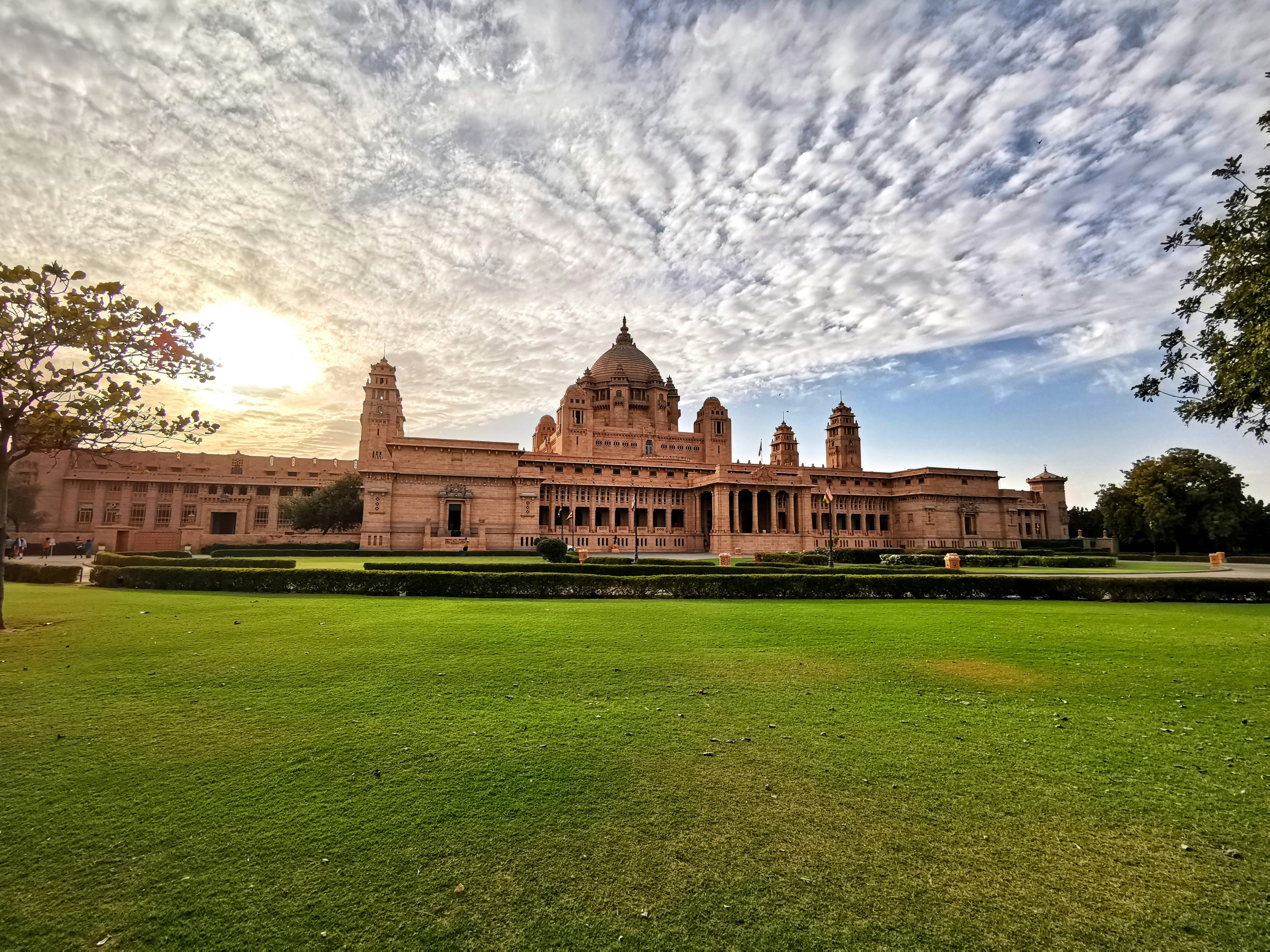 Umaid Bhawan Palace in Jodhpur beneath a dramatic sky