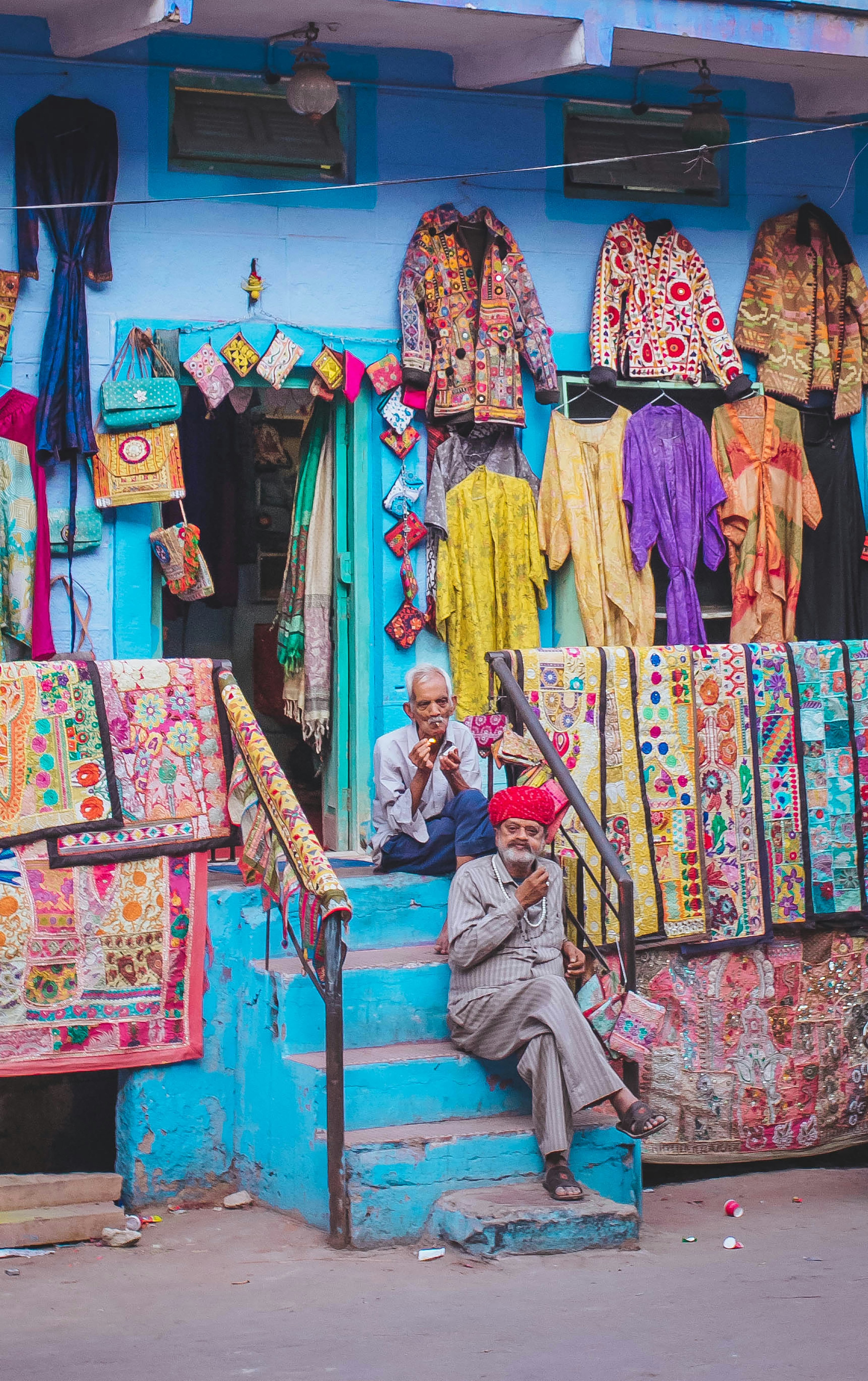 Colourful embroidered textiles displayed in a traditional Jodhpur market